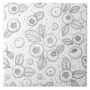 Blueberries on black and white ceramic tile