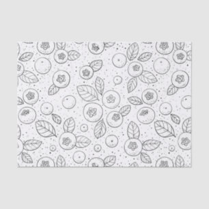 Blueberries on black and white tissue paper