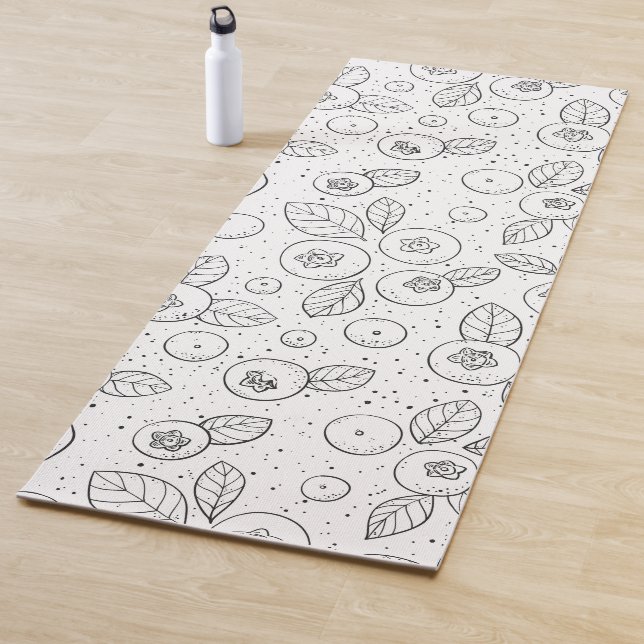 Blueberries on black and white yoga mat (In Situ)