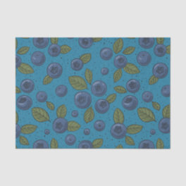 Blueberries on blue tissue paper