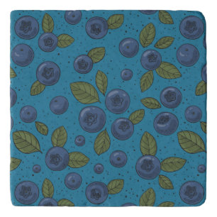 Blueberries on blue trivet