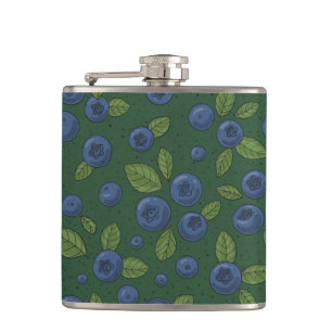 Blueberries on dark green flask