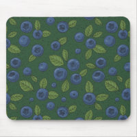 Blueberries on dark green