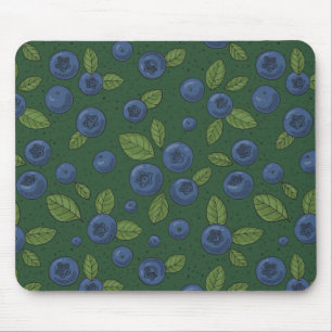 Blueberries on dark green mouse pad