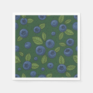 Blueberries on dark green napkins