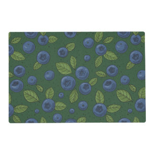 Blueberries on dark green placemat
