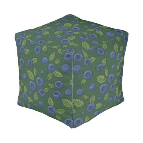 Blueberries on dark green pouf