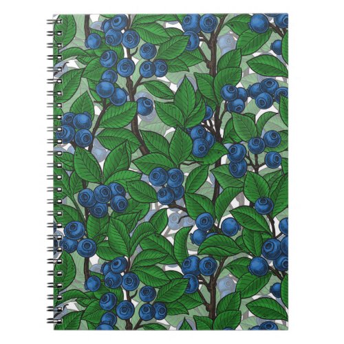 Blueberry on white notebook