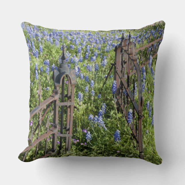 Bluebonnets and phlox surrounding cemetery gate throw pillow (Front)