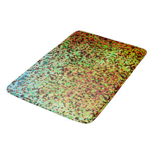 Blurred green and orange small squares or tile bath mat