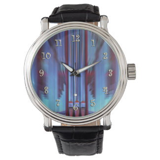 Blurred organ pipes with numbers watch