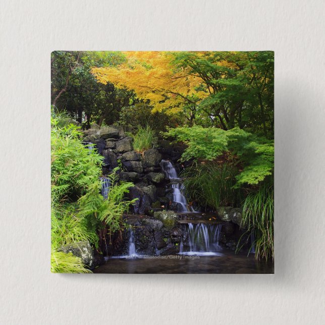 Blurred Rock Waterfall, Maple Green & Orange Trees Button (Front)