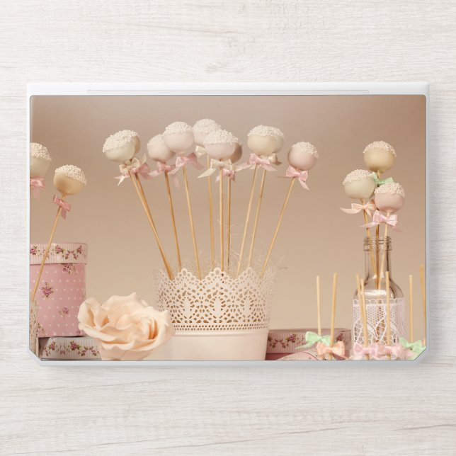 Blurry Dessert Table with Pink and White Cakes and HP Laptop Skin (Front)