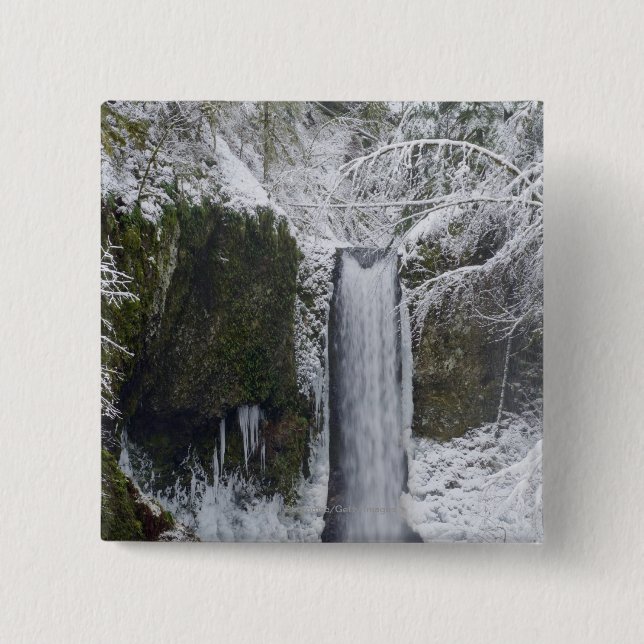 Blurry Waterfall Surrounded by a Snowy Forest Button (Front)