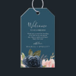 Blush and Navy Flowers | Blue Wedding Welcome Gift Tags<br><div class="desc">These blush and navy flowers blue wedding welcome gift tags are perfect for a floral wedding. The classic and elegant design features modern watercolor navy blue and blush pink flowers on a teal blue background. Personalize the tags with the location of your wedding, a short welcome note, your names, and...</div>
