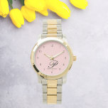 Blush Blossom Script Elegance Watch<br><div class="desc">Introducing our Blush Blossom Script Elegance Watch—an exquisite accessory that seamlessly blends sophistication with personal charm. This captivating timepiece showcases a delicate script font, featuring your first initial and full name, creating a truly unique masterpiece. Meticulously crafted with top-tier materials, this watch is designed to be a lasting symbol of...</div>