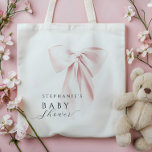 Blush Pink Bow Baby Shower  Tote Bag<br><div class="desc">Add a touch of elegance and sweetness to your baby shower celebration with this chic tote bag featuring a delicate pink bow and a personalized script initial monogram. The soft, feminine design makes it the perfect accessory for moms-to-be or guests, adding a cute and stylish accent to the event. Customize...</div>