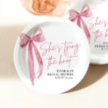 Blush Pink Bow She's Tying the Knot Bridal Shower Paper Plates<br><div class="desc">Elevate your bridal shower table setting with our Blush Pink Bow "She's Tying the Knot" Bridal Shower Paper Plates. Adorned with a charming pink bow design, these paper plates add a touch of elegance to your celebration. Serve up delicious treats and delights on these lovely plates, creating a memorable dining...</div>