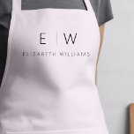 Blush Pink Elegant Minimalist Monogram Name Apron<br><div class="desc">Elevate your culinary experience with our Classic Elegant Modern Minimalist Monogram Name Cooking Apron. This kitchen essential seamlessly merges timeless elegance with contemporary minimalism. Crafted with precision, this apron is not just a practical accessory but also a statement of personal style. The customizable monogram and name option allows you to...</div>