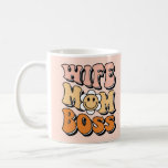 Blush Pink Groovy Wife Mom Boss Coffee Mug<br><div class="desc">Celebrate the dynamic woman in your life with the "Blush Pink Groovy Wife Mom Boss Coffee Mug." This stylish mug features a groovy design with the empowering words "Wife, Mom, Boss" in playful, retro-inspired typography. The soft blush pink background adds a touch of elegance and femininity, making it a perfect...</div>