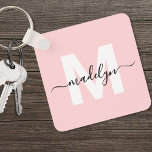 Blush Pink Initial Name Monogram Keychain<br><div class="desc">Create Your Own Stylish Modern Custom World Traveler Girly Blush Pink Monogram Square Keychain. This cute square keychain brings a fun and modern touch to your everyday essentials. The design features a bold white monogram initial centered on a soft blush pink background, with your name in elegant black script layered...</div>