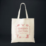 Blush Pink Last Rodeo Cowgirl Bachelorette Party Tote Bag<br><div class="desc">This Blush Pink Last Rodeo Cowgirl Bachelorette Party Tote Bag features a hand drawn layout with hand drawn illustrations along with a western font! You have freedom to create something uniquely yours! Easily edit wording and colors to match your style! Text and background colors are fully editable >>>click the "Edit...</div>