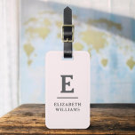 Blush Pink Minimal Modern Monogram  Luggage Tag<br><div class="desc">Elevate your travel experience with our Classic Elegant Modern Minimalist Monogram Luggage Tag. This meticulously designed accessory seamlessly combines timeless elegance with contemporary minimalism, ensuring your luggage stands out with sophistication. Crafted with precision and attention to detail, this luggage tag is more than just a practical item; it's a personalized...</div>