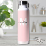 Blush Pink Modern Name Monogram Water Bottle<br><div class="desc">Create Your Own Personalized Blush Pink Name Monogram Water Bottle. This cute and stylish water bottle features a soft blush pink background with a bold white initial in the center, overlaid by a flowing black script name for a personalized touch on both sides. Ideal for students, teachers, gym-goers, and fitness...</div>