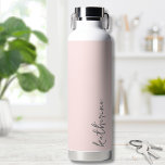 Blush Pink Simple Your Name Water Bottle<br><div class="desc">Simple yet stunning.  Personalize this water bottle with your name,  or a loved ones name.  A simple elegant script typography with a girly edge.  Change out the background and font colors to anything you want. Blush Pink Trendy Simple Your Name Minimalist Water Bottle</div>