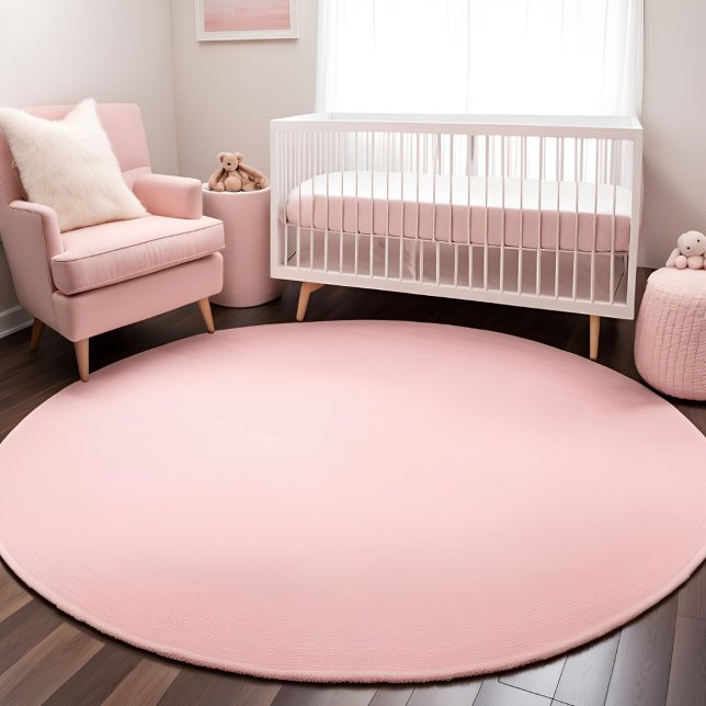 Blush Pink Solid Color Round Rug (Pinkify your baby girl's nursery with this pretty blush pink round area rug.)