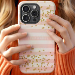 Blush Pink Stripes Gold Glitter Confetti Monogram iPhone 15 Case<br><div class="desc">Description: This chic and elegant phone case features a stunning blush pink and white striped pattern adorned with gold confetti accents. Personalized with your name in a stylish monogram, this design is perfect for those who appreciate modern and girly aesthetics. Add a touch of glamour to your everyday accessory with...</div>