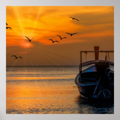 Boat facing the sunset in Pak Meng Trang Province Poster