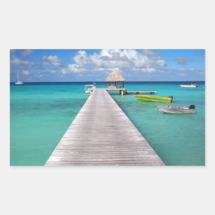 Boats at a jetty in the Pacific rectangle sticker