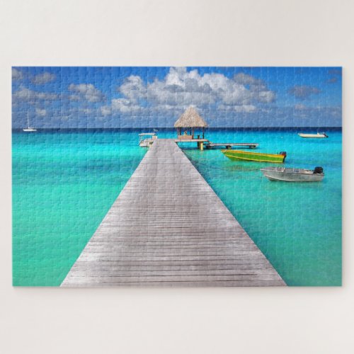 Boats on a jetty in a tropical blue lagoon jigsaw puzzle