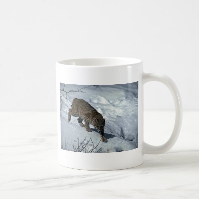 Bobcat on snow coffee mug (Right)