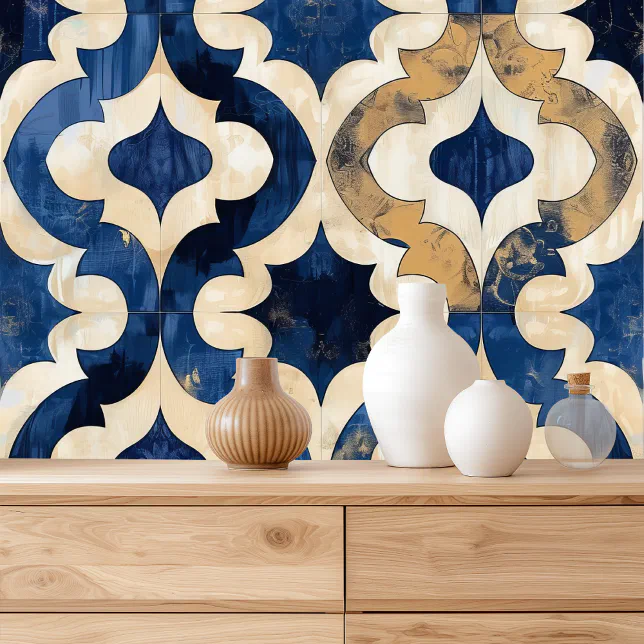A wooden table with white, brown and clear vases with blue and gold moroccan style wallpaper on the wall in the background.
