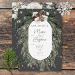 Boho Charcoal Pine Winter Sparkle Wedding Save The Date<br><div class="desc">This design features a rustic green pine and pinecone bouquet on a charcoal background with white flowers. It is accented with a white sparkle overlay to illustrate the magic of the beautiful winter holidays. Perfect for a Christmas or winter wedding. This card is part of the Boho Green Pine Winter...</div>