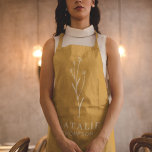 Boho Chic Personalized Monogram Mustard Yellow Apron<br><div class="desc">Introducing our Boho Chic Personalized Monogram Mustard Yellow Apron, a perfect blend of modern minimalism and sophisticated style. Crafted with a neutral mustard yellow fabric, this apron embodies a trendy yet timeless aesthetic, ideal for both home cooks and professional stylists. The modern minimalist design features clean, simple lines and trendy...</div>