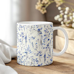 Boho Navy Blue Watercolor Wildflowers  Coffee Mug<br><div class="desc">Start your day with a touch of boho charm using the "Boho Navy Blue Watercolor Wildflowers Coffee Mug." This beautifully designed mug features delicate navy blue wildflowers painted in a watercolor style, bringing an elegant and serene feel to your morning coffee or tea. The intricate floral pattern wraps around the...</div>