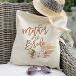 Boho Pampas Floral Mother of the Bride Tote Bag<br><div class="desc">This stylish boho pampas floral tote bag makes the perfect gift for the mother of the bride on your wedding day. Featuring a beautiful watercolor floral design with trendy pampas grass accents, this tote bag is both practical and fashionable. Use it to carry essentials on the big day or as...</div>