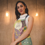 Boho Patchwork Quilt and Heart Shape Personalized Apron<br><div class="desc">This pretty apron is ready to be personalized with a name. This apron has a illustrated design with the look of a colorful boho style patchwork quilt. A cream colored heart shaped graphic with faux stitching accents is ready to be personalized with a name in navy blue script or cursive...</div>