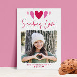 Boho Sending Love Pink Photo Valentine's Day Holiday Card<br><div class="desc">Send love to family and friends with this cute Valentine's Day photo card! The card features boho-style hearts at the top in shades of pink, fuchsia, and red with "Sending Love" in handwritten script. Your photo is displayed inside of a white textured mask frame. Personalize the boho Valentine's Day photo...</div>