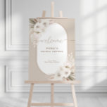 Boho White and Neutral Dried Floral Welcome Sign<br><div class="desc">Celebrate the bride-to-be with this elegant bridal shower welcome sign featuring an oval shaped botanical frame with white watercolor flowers,  palm leaves and dried foliage in white and neutral tones such as tan,  beige and taupe. With elegant handwriting calligraphy.</div>