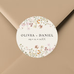 Boho Wildflower Beige Garden Wedding Classic Round Sticker<br><div class="desc">Add a charming touch to your wedding stationery or favors with our Boho Wildflower Beige Garden Wedding Classic Round Sticker. Featuring delicate wildflower illustrations on a soft beige background, this versatile sticker is perfect for sealing envelopes, adorning favor bags, or adding a personal touch to decor. Its elegant design complements...</div>