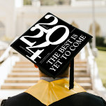 Bold 2024 Elegant Black White Graduation Cap Topper<br><div class="desc">Celebrate your graduation with this personalized graduation cap topper! This one-of-a-kind topper displays a striking black background with bold typography for the 2024 class year, the graduate's name, and school name. To top it off, we've included an inspirational saying, 'The best is yet to come, ' to remind you of...</div>