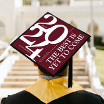 Bold 2024 Elegant Burgundy Graduation Cap Topper<br><div class="desc">Celebrate your graduation with this personalized graduation cap topper! This one-of-a-kind topper displays a elegant burgundy background with bold typography for the 2024 class year, the graduate's name, and school name. To top it off, we've included an inspirational saying, 'The best is yet to come, ' to remind you of...</div>