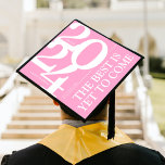 Bold 2024 Pretty Pink Graduation Cap Topper<br><div class="desc">Celebrate your graduation with this personalized graduation cap topper! This one-of-a-kind topper displays a pretty pink background with bold typography for the 2024 class year, the graduate's name, and school name. To top it off, we've included an inspirational saying, 'The best is yet to come, ' to remind you of...</div>