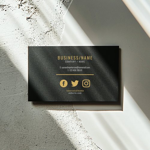 Bold black and gold modern social media business card