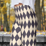 Bold Black and Papaya Harlequin Check Pattern Leggings<br><div class="desc">Striking and Chic: Add some bold contrast to your wardrobe with these Harlequin pattern leggings! Their vibrant colors and unique design are perfect for making a powerful statement in any casual outfit. Comfortable and stylish, these leggings are ideal for anyone who loves to stand out. Don’t wait—grab yours and turn...</div>