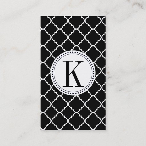 Customizable bold black and white quatrefoil business card template